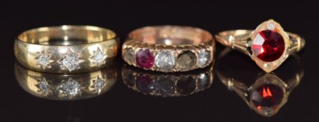 Three 9ct gold rings, one set with diamonds and the other two with paste, 5.7g