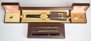 Dunhill watch, Dunhill stud, Dunhill cufflinks and pen together with two silver pots, all cased