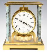 Jaeger-LeCoultre Atmos mantel clock, with brass case, marble or similar columns and white painted