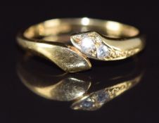 An 18ct gold ring set with two diamonds, 1.7g, size G