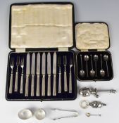 Hallmarked silver items including cased set of seal top spoons, two napkin rings and pair of sugar