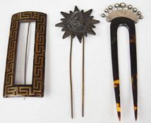 Two hair pins, one horn example carved into a cameo and the other Chinese silver, together with a