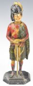 Novelty cast metal Highland / Scottish soldier table lighter, height 23cm