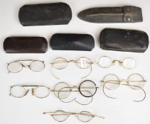 Seven sets of rolled gold and similar vintage spectacles, some in original boxes