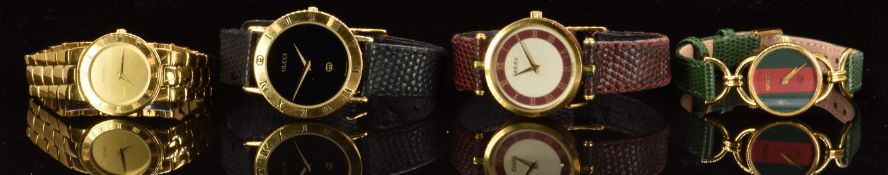 Four various Gucci wristwatches comprising 3000M, 3300.2.L, 6000L and one other, three on leather