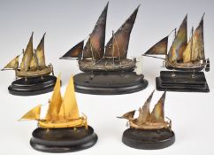 Five Maltese silver models of a sailing boats, with Maltese silver marks to keels, one being