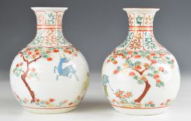A pair of 19thC Chinese bottle vases with enamelled decoration of animals, height 17cm