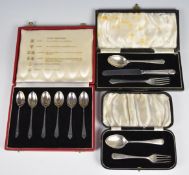 Cased set of six novelty hallmarked silver teaspoons, each assayed at a different office, cased