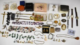 A collection of costume jewellery including vintage brooches, agate necklace, amethyst necklace,
