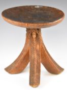 African tribal four legged carved stool, height 30cm