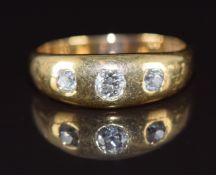 Victorian 18ct gold ring set with three old cut diamonds, the centre diamond approximately 0.17ct,