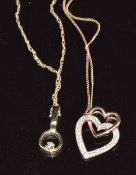 Two 9ct gold chains and pendants set with diamonds, 1.9g