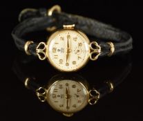 Tudor 9ct gold ladies wristwatch with subsidiary seconds dial, gold hands and Arabic numerals, white