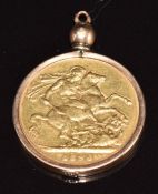 An 1896 gold full sovereign, in 9ct rose gold mount, 8.9g