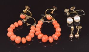 Three pairs of 9ct gold earrings set with pearls, coral and studs, 10.8g
