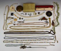 A collection of jewellery including silver fox head pin, silver brooch set with marcasite, silver