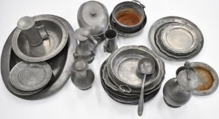 Mainly circa 18th / 19thC pewter items to include large oval platter, circular plates, jugs and a