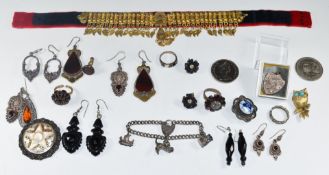 A collection of silver jewellery including charm bracelet, three rings, three pairs of earrings etc,