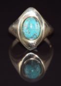 A 14k gold ring set with a turquoise cabochon, 5.7g, size P