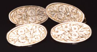 A pair of 9ct gold cufflinks engraved with floral decoration, 5.1g.