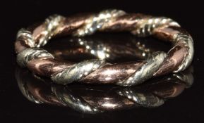 A 9ct bi-coloured rose gold and white gold rope twist ring, 3g, size K