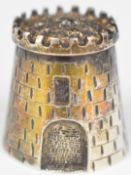Irish Elizabeth II hallmarked silver novelty thimble formed as a castle, Dublin 1994, maker