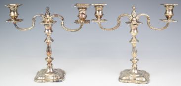 Pair of Elizabeth II hallmarked silver candelabra, also with the branches removed forming