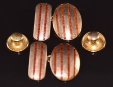 A pair of 9ct gold cufflinks set with red guilloché enamel, Birmingham 1911, and two 9ct gold studs,