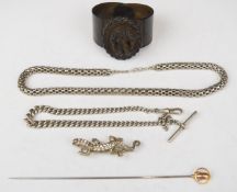 Victorian vulcanite bracelet with carved plaque depicting Lily of the valley, silver brooch in the