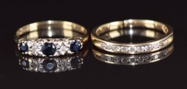 A 14k gold half eternity ring set with diamonds (1.7g, band has been cut) and a 9ct gold ring set