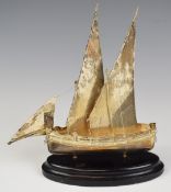 Two Maltese silver models of a sailing boats, with Maltese silver marks to keels, on ebonised bases,