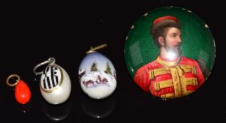 Russian c1870 lacquer button depicting the Tsar, a Russian egg pendant 'XB' and a ceramic Russian