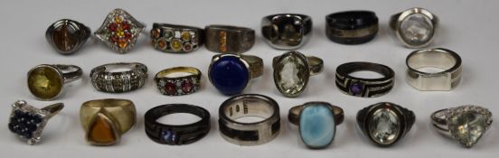 Twenty silver rings including diamond, sapphire, quartz, etc