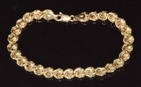 A 9ct gold bracelet made up of knotted links, 3.8g, 16cm long