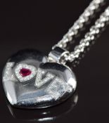 Chopard 18ct white gold  'love' pendant set with a heart cut ruby and diamonds reading 'love', on
