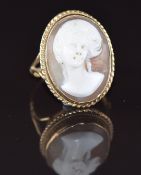 A 9ct gold ring set with a cameo of a young woman, 5.6g, size M