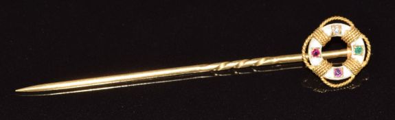 Victorian stick pin in the form of a lifebuoy set with enamel, a diamond, ruby, amethyst and emerald