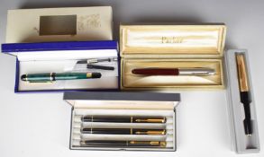 Cased Parker and Waterman pens