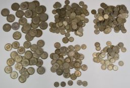 Approximately 1706g of pre-1947 UK silver coinage which includes gradeable example