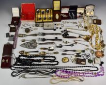 A collection of costume jewellery including three silver rings, Art Deco silver necklace, vintage