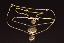 Two 9ct gold chains, 9ct gold bow brooch with heart locket (8.9g) and two 9ct gold back and front