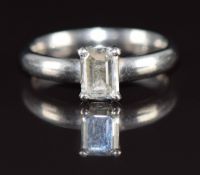 A platinum ring set with a 1.01ct emerald cut diamond. with GIA certificate, 3.5g, size L