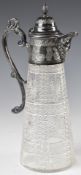 19th or early 20thC cut glass silver plated claret jug with mask spout, height 31cm