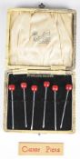 Cased set of Art Deco silver cherry cocktail sticks, in original Cooke & Kelvey of Calcutta &