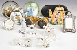 Hallmarked silver miniature photograph frames, enamel teapots, Swarovski and Waterford glass