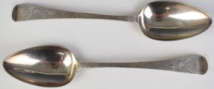 Pair of Georgian hallmarked silver table spoons with bright cut decoration, London 1795, maker