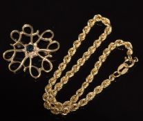 A 9ct gold brooch set with a sapphire (1.9g, 1.8cm) and 9ct gold rope twist bracelet (1.2g, 16cm)