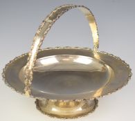 Mappin & Webb George V hallmarked silver swing handled basket or pedestal dish, Sheffield 1922,
