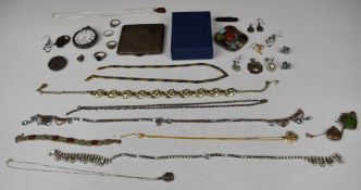 A collection of silver and jewellery including cigarette case, photograph frame, silver chains,