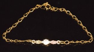 A 10k gold Harley-Davidson motorcycle link / panel set on a 10k rolled gold bracelet